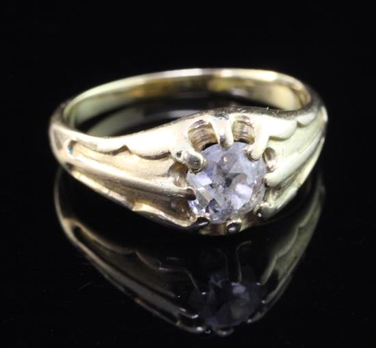 An early 20th century 18ct gold and claw set solitaire diamond ring, size P.